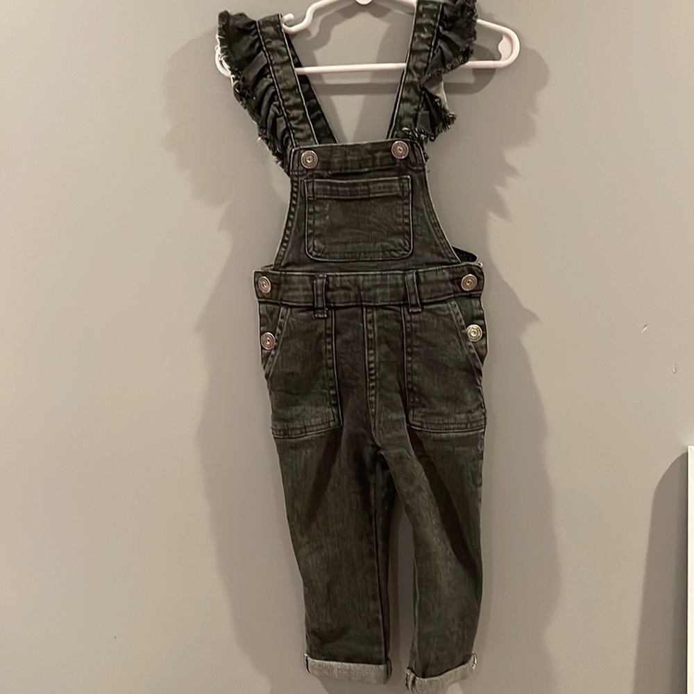 Black denim overalls gently worn